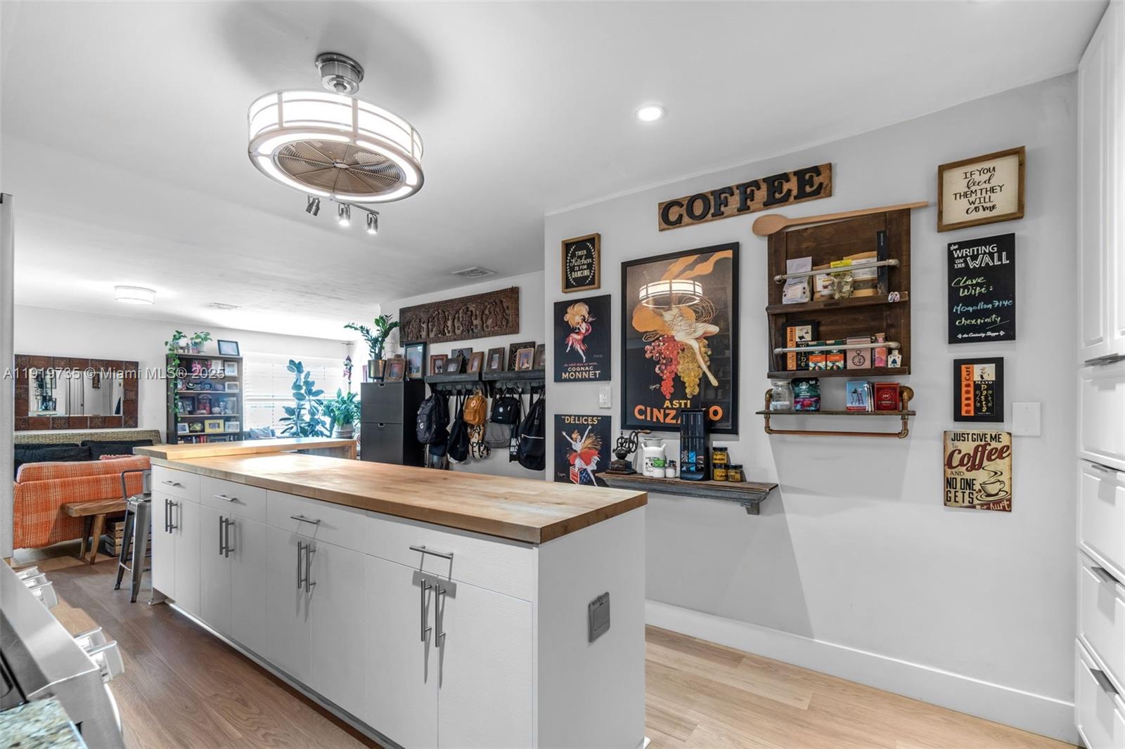 20130 Southwest 106th Court Cutler Bay, FL 33189 - Photo 7 of 42 a room with stainless steel appliances kitchen island a large counter space cabinets and furniture