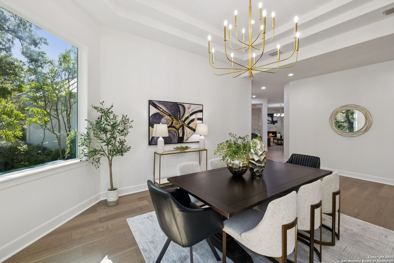 207 Box Oak Shavano Park, TX 78230 - Photo 12 of 50 a view of a dining room with furniture and chandelier