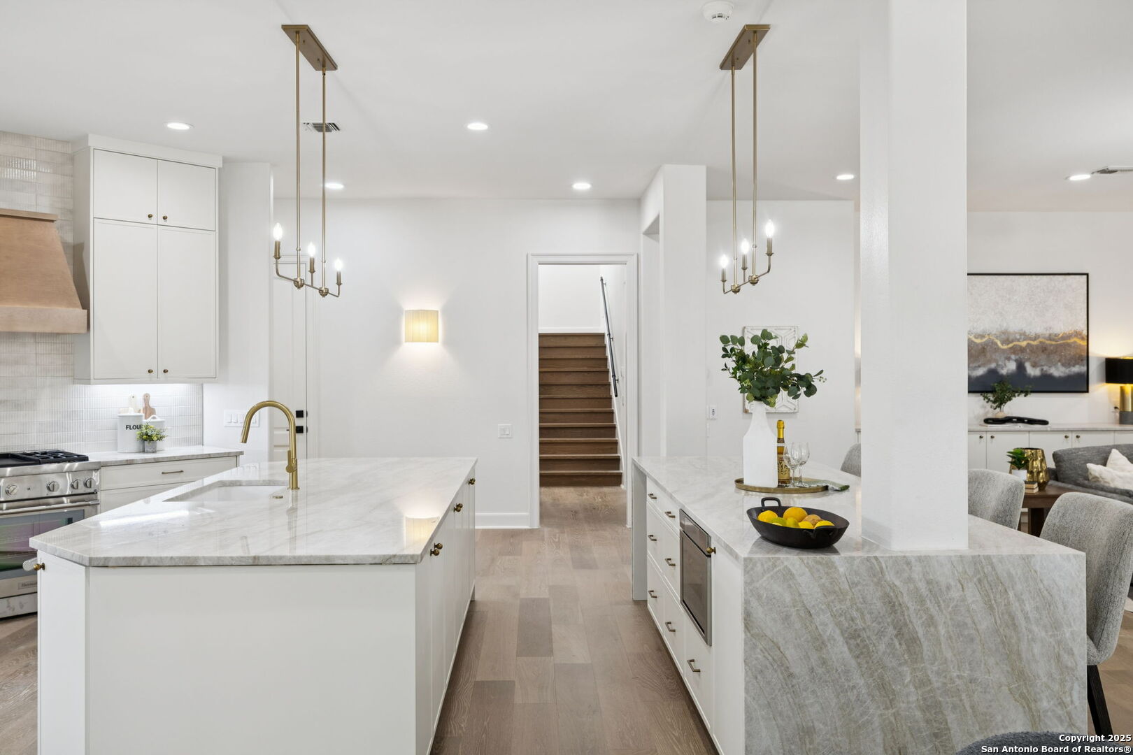 207 Box Oak Shavano Park, TX 78230 - Photo 17 of 50 a kitchen with sink and refrigerator
