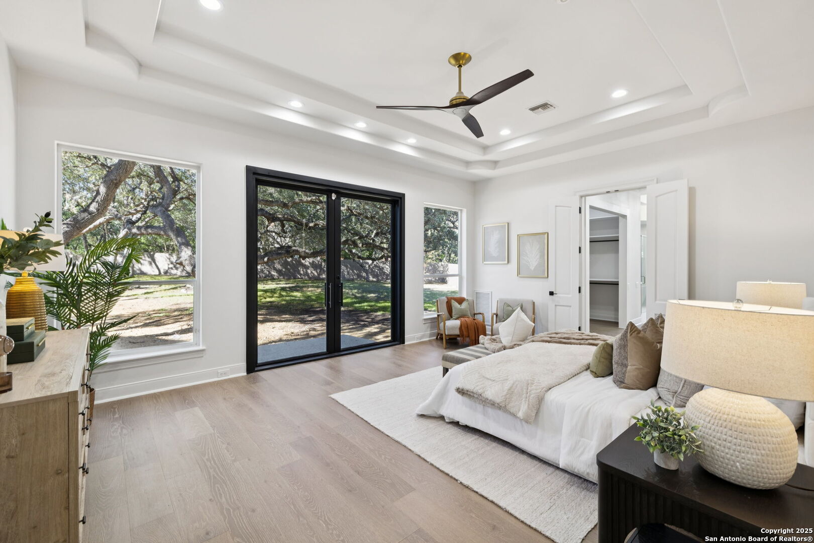 207 Box Oak Shavano Park, TX 78230 - Photo 27 of 50 a living room with furniture and large windows