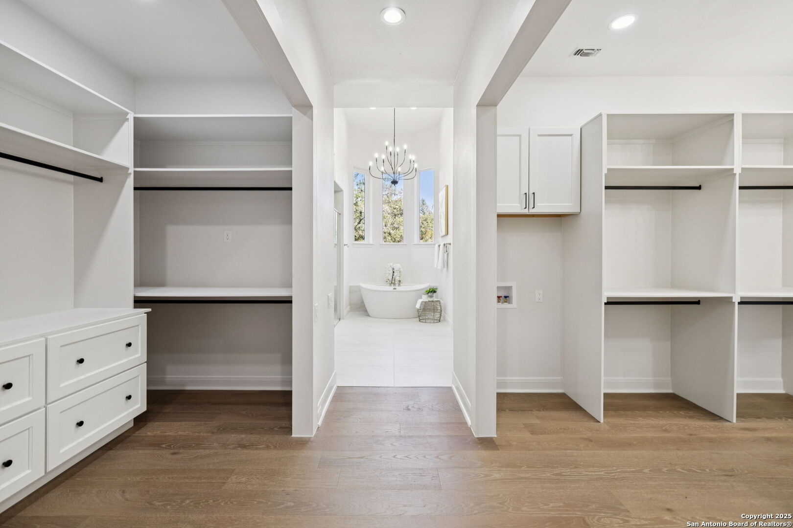 207 Box Oak Shavano Park, TX 78230 - Photo 30 of 50 a view of walk in closet with cabinet and entryway