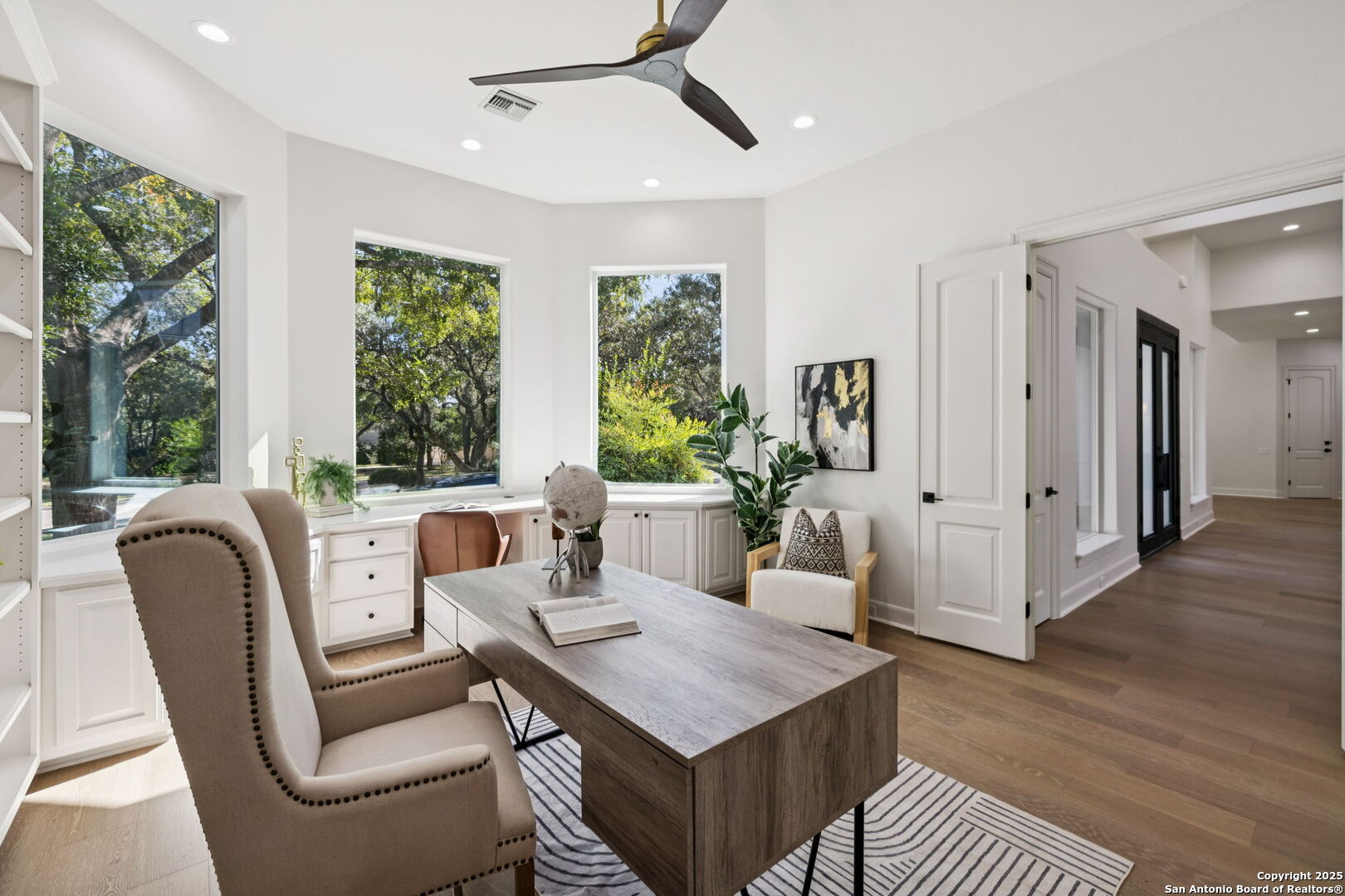 207 Box Oak Shavano Park, TX 78230 - Photo 10 of 50 a living room with furniture and a large window