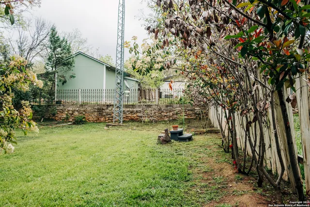 a stove top oven sitting inside of a kitchen