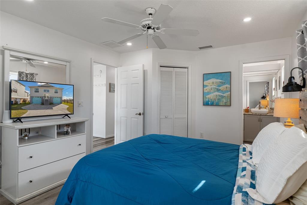 4046 Casa Court Hernando Beach, FL 34607 - Photo 19 of 58 a bedroom with a bed and a dresser