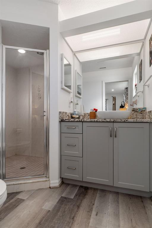 4046 Casa Court Hernando Beach, FL 34607 - Photo 21 of 58 a bathroom with a granite countertop sink mirror and