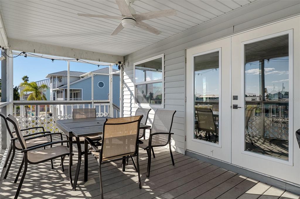 4046 Casa Court Hernando Beach, FL 34607 - Photo 28 of 58 a view of a dining room with furniture and window