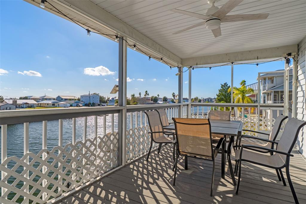 4046 Casa Court Hernando Beach, FL 34607 - Photo 29 of 58 a view of a chairs and table in the balcony
