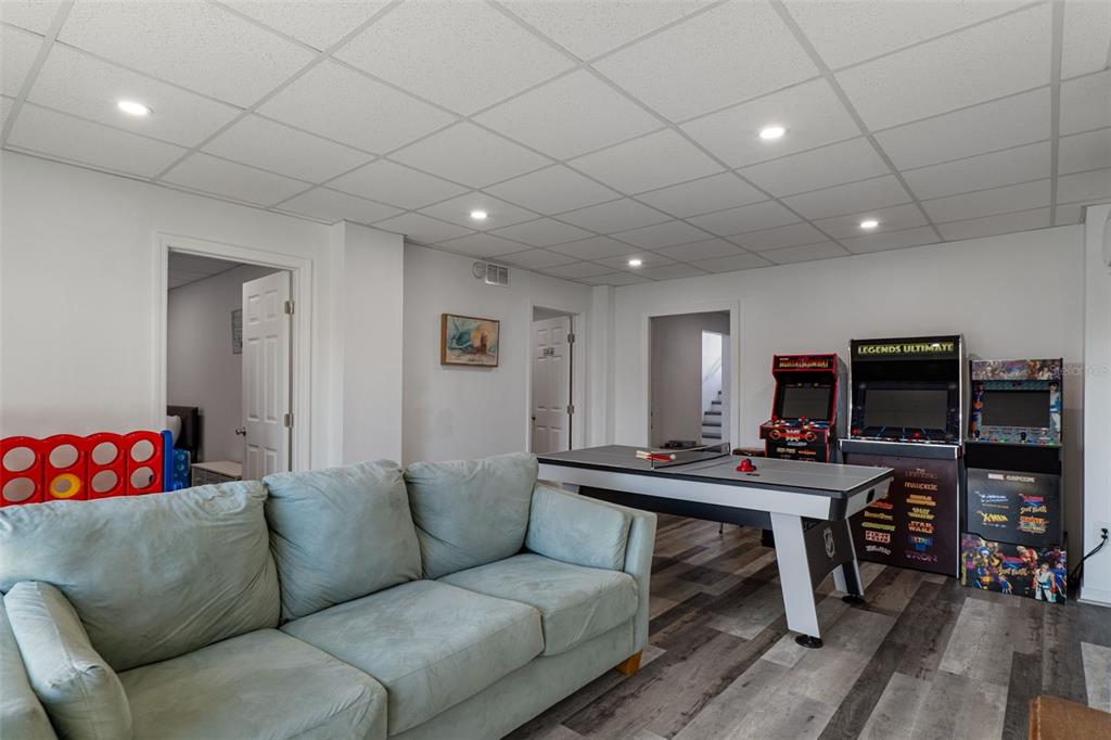4046 Casa Court Hernando Beach, FL 34607 - Photo 32 of 58 a living room with furniture and a flat screen tv