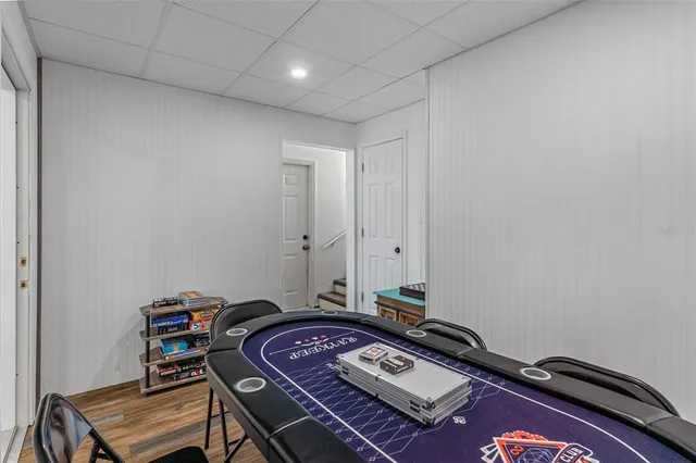 a house view with a sitting space and outdoor seating