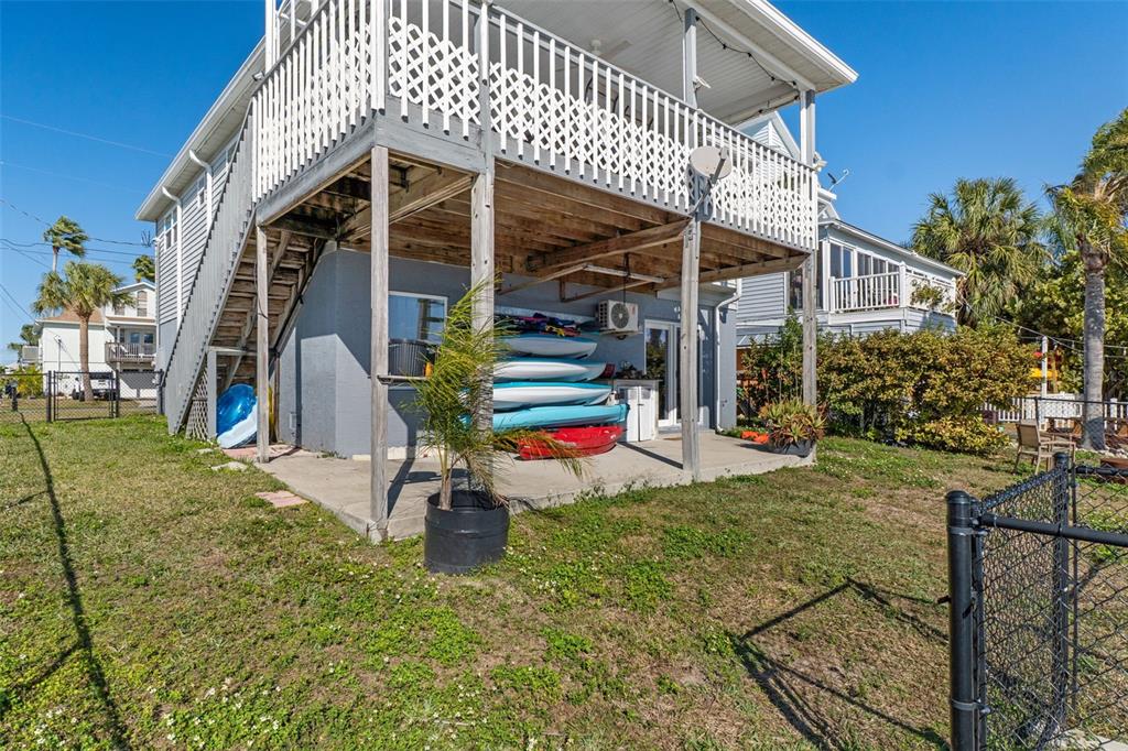 4046 Casa Court Hernando Beach, FL 34607 - Photo 41 of 58 a view of a house with backyard and sitting area