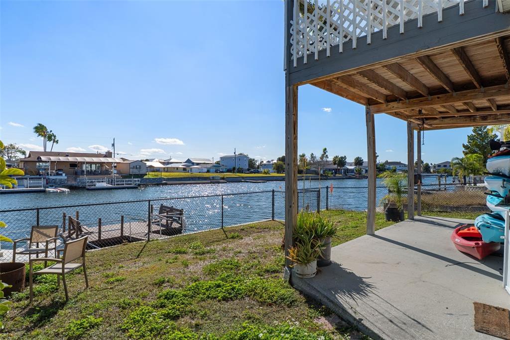 4046 Casa Court Hernando Beach, FL 34607 - Photo 43 of 58 a view of a chairs and table in the patio