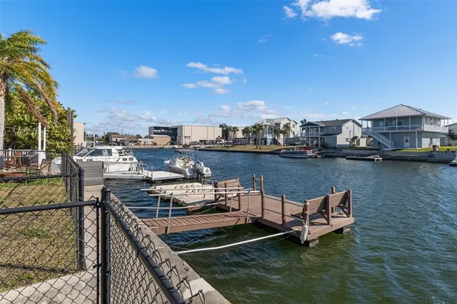 an aerial view of a city with ocean view