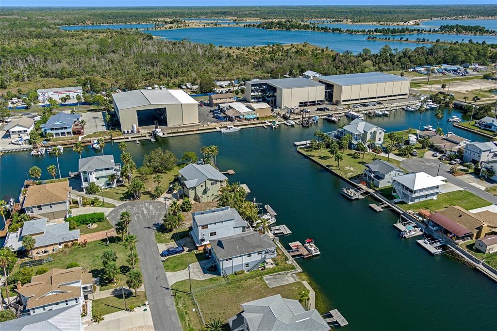 4046 Casa Court Hernando Beach, FL 34607 - Photo 47 of 58 an aerial view of a house with a lake view