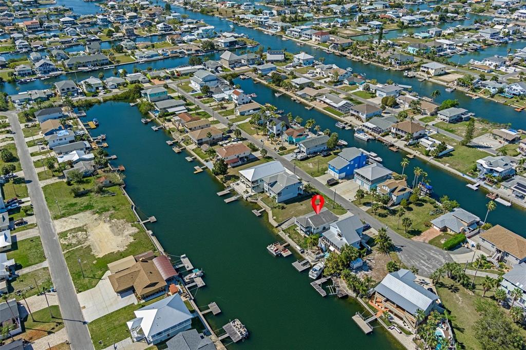 4046 Casa Court Hernando Beach, FL 34607 - Photo 48 of 58 an aerial view of lake residential houses with outdoor space