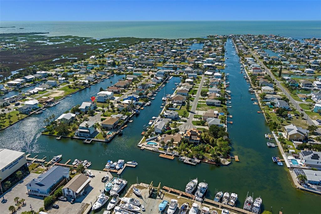 4046 Casa Court Hernando Beach, FL 34607 - Photo 51 of 58 an aerial view of a city with ocean view