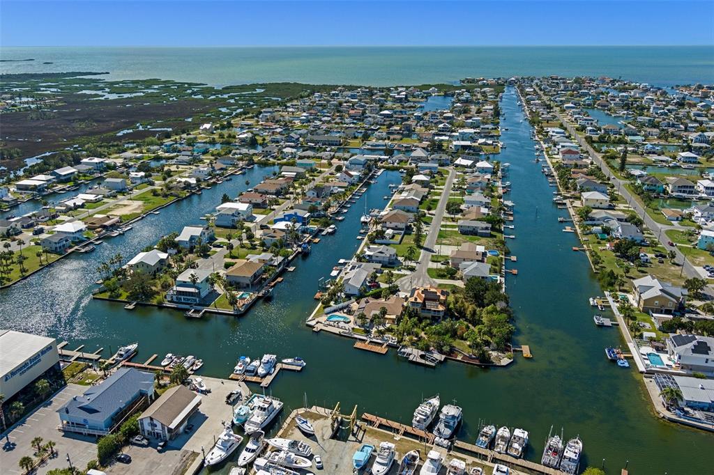 4046 Casa Court Hernando Beach, FL 34607 - Photo 52 of 58 an aerial view of a city with ocean view