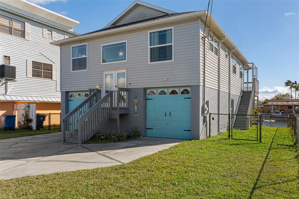 4046 Casa Court Hernando Beach, FL 34607 - Photo 58 of 58 a view of a house with a backyard