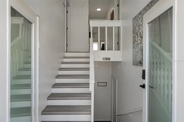 a view of entryway with a front door