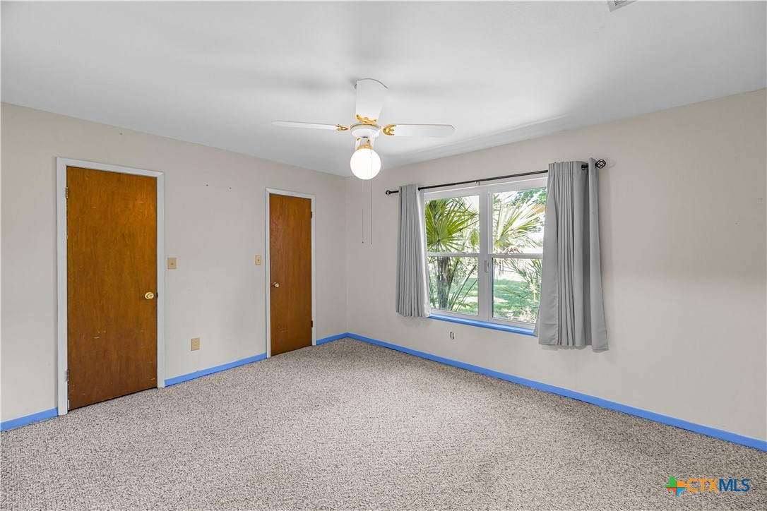20 Hambleton Road Victoria, TX 77905 - Photo 23 of 48 an empty room with windows and fan