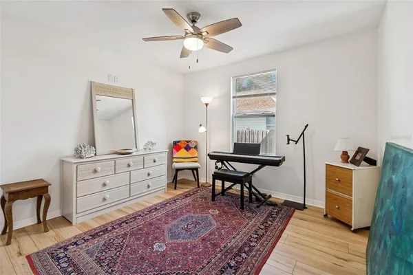 a kitchen with stainless steel appliances a stove a microwave and cabinets