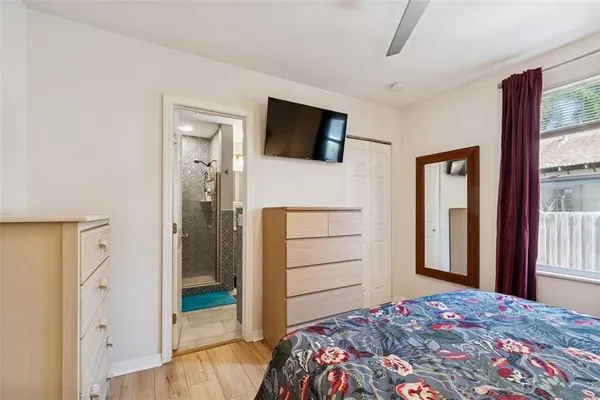 a balcony view with a seating space