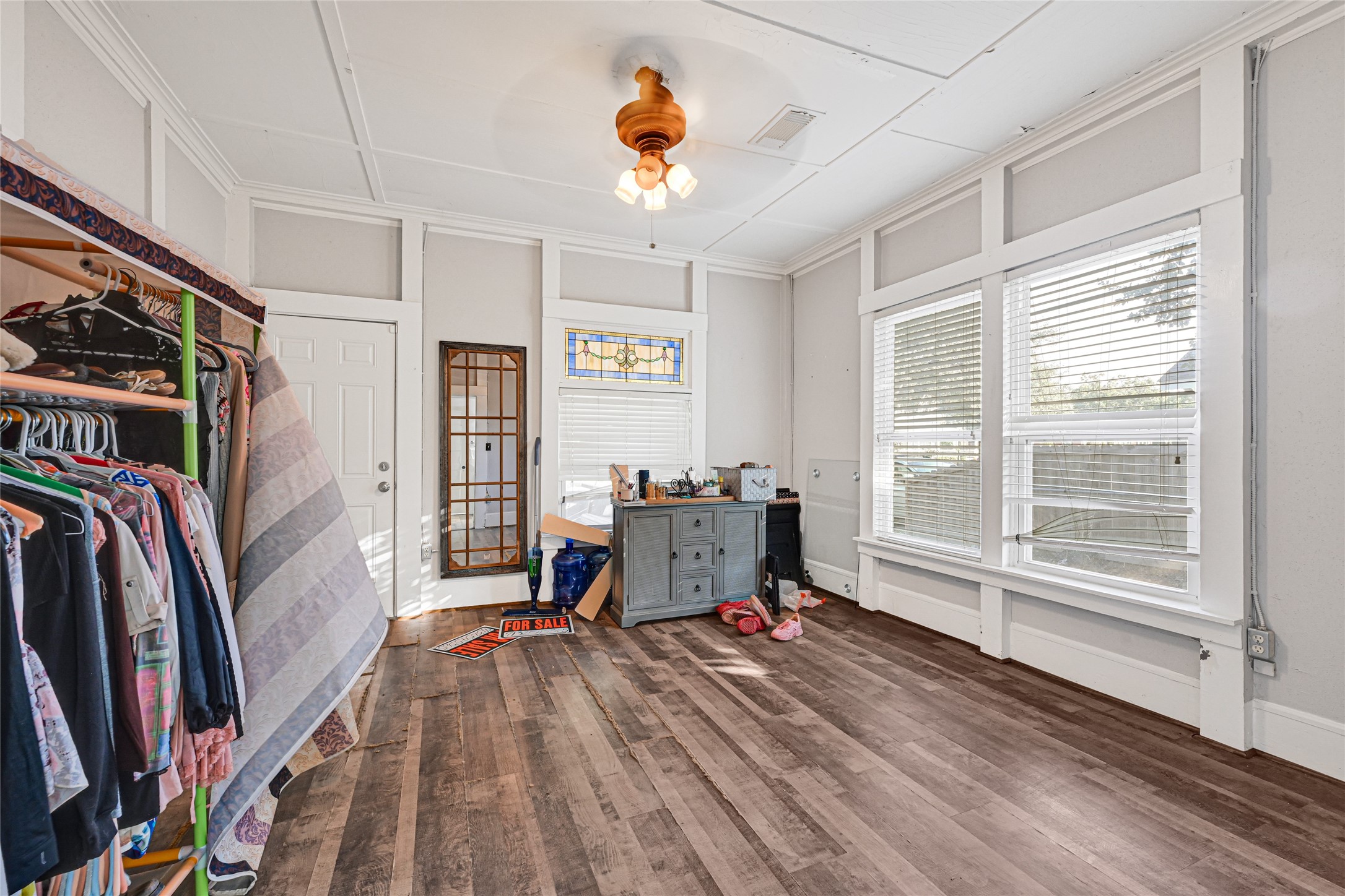102 4th Street Sugar Land, TX 77498 - Photo 12 of 50 a workspace with furniture hardwood and a window