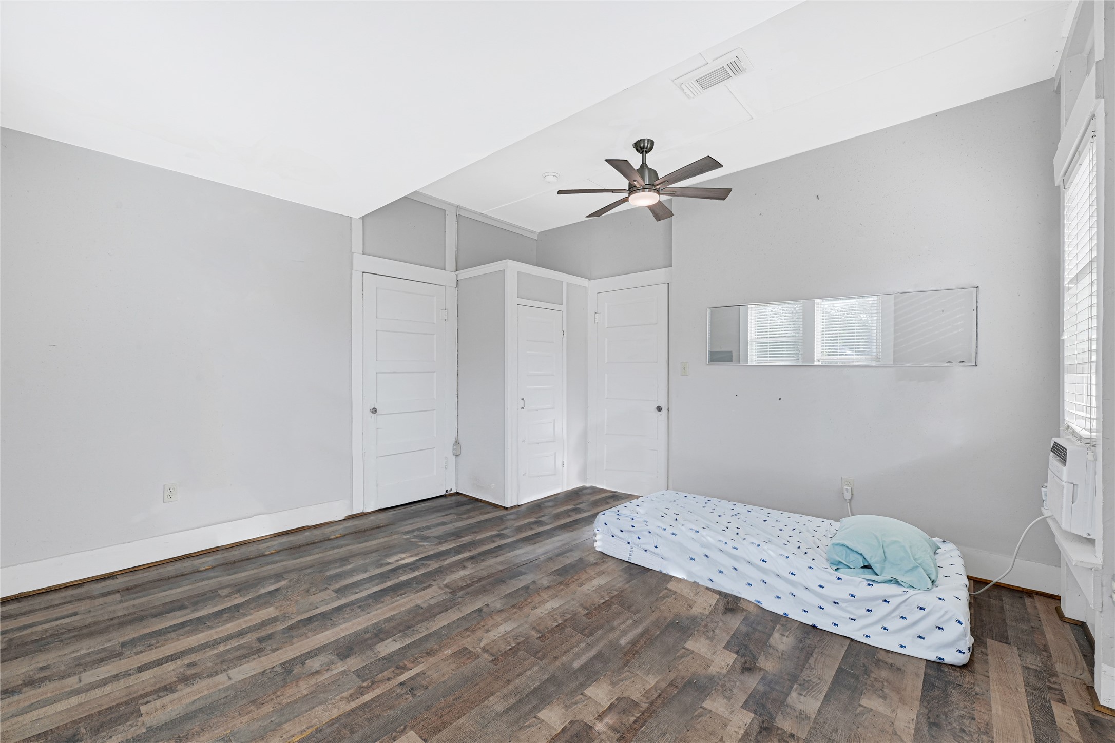 102 4th Street Sugar Land, TX 77498 - Photo 23 of 50 a bedroom with a bed and a window
