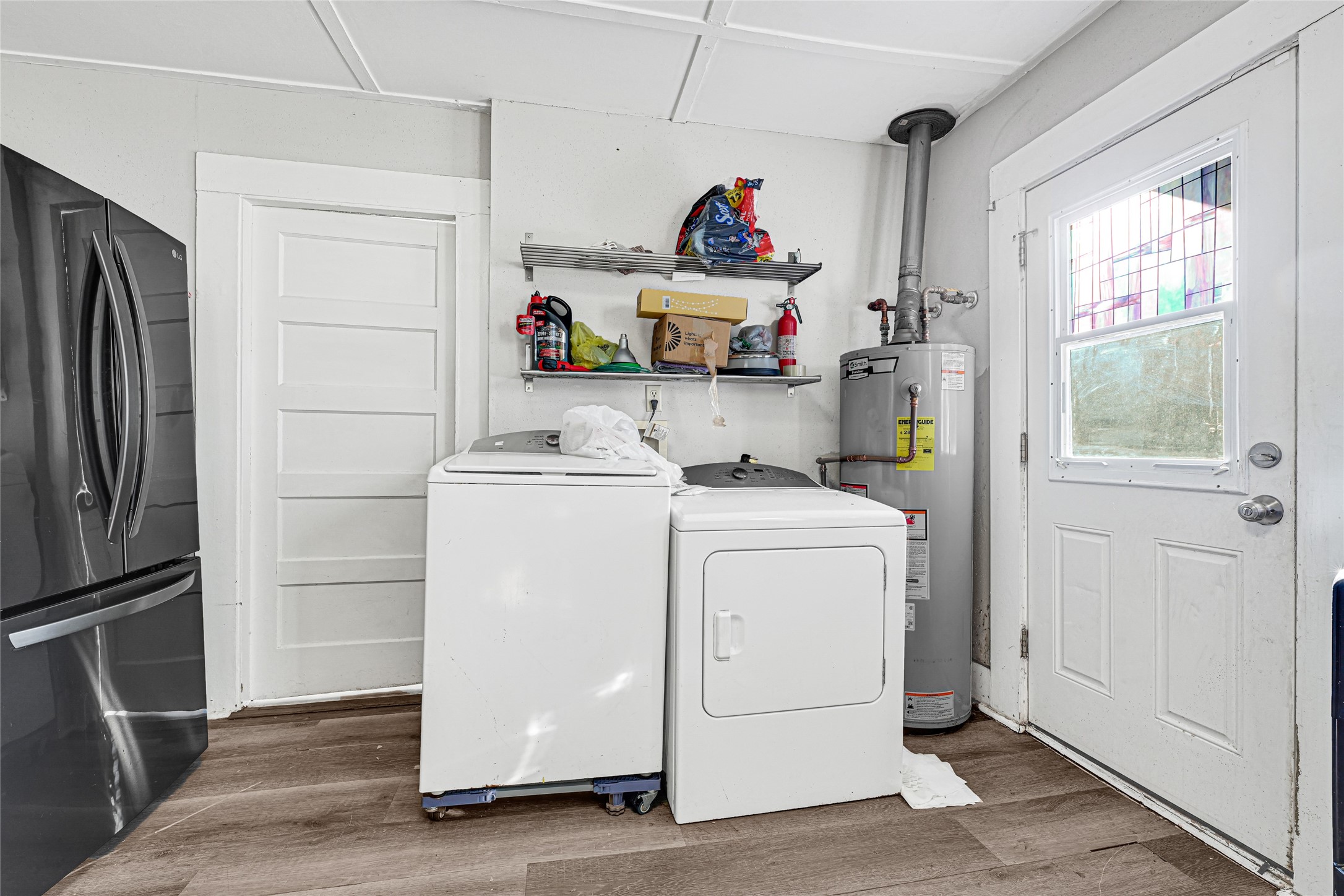 102 4th Street Sugar Land, TX 77498 - Photo 33 of 50 a room with storage and utility