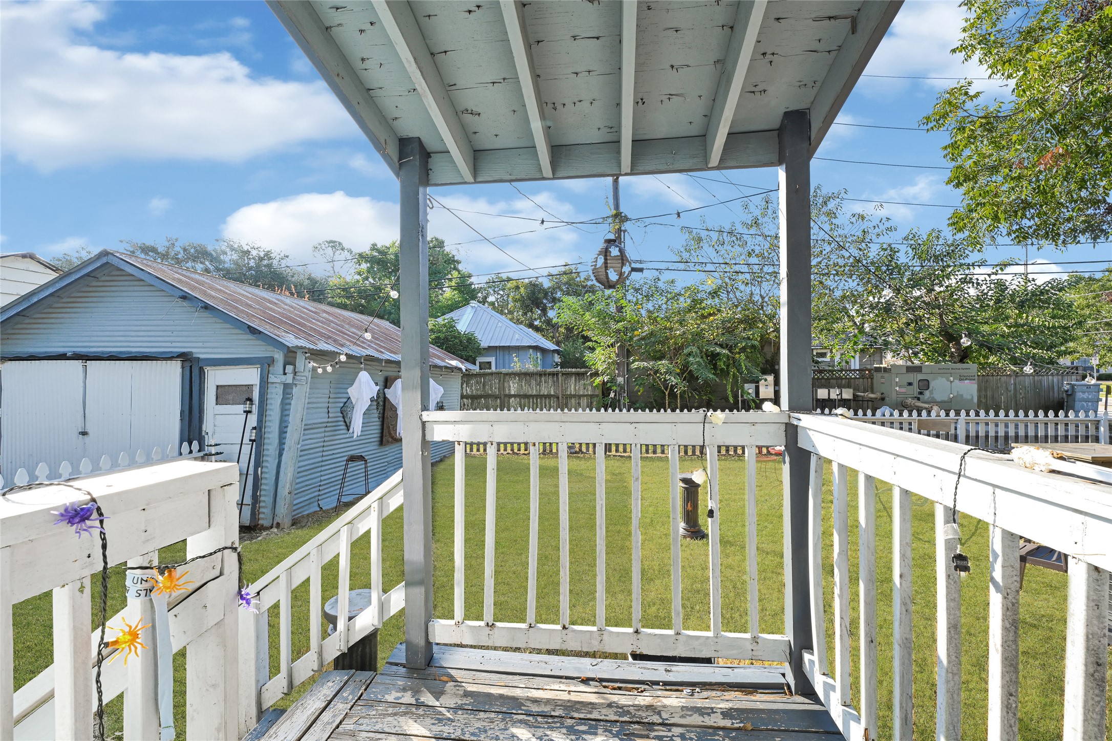 102 4th Street Sugar Land, TX 77498 - Photo 35 of 50 a view of small house with wooden floor and outdoor space