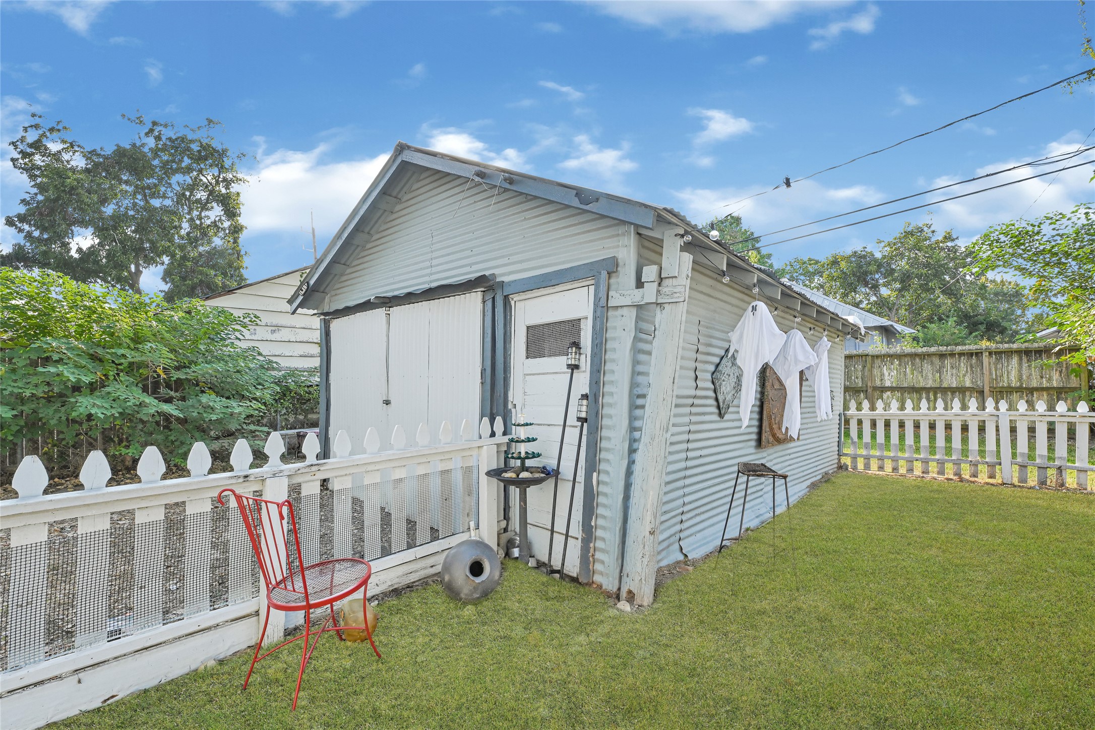102 4th Street Sugar Land, TX 77498 - Photo 45 of 50 a view of a house with wooden fence and a porch