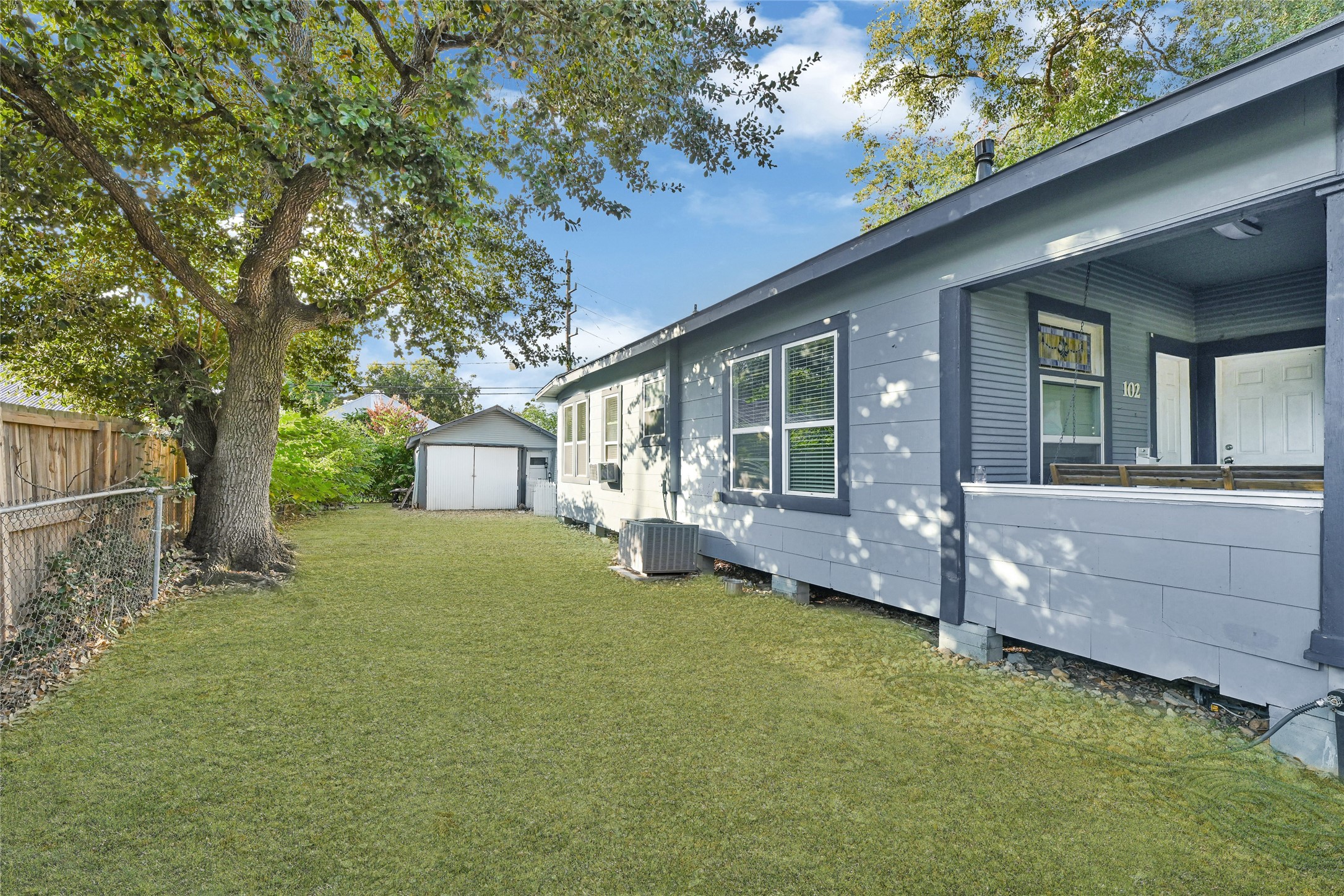 102 4th Street Sugar Land, TX 77498 - Photo 47 of 50 a view of a house with backyard and sitting area