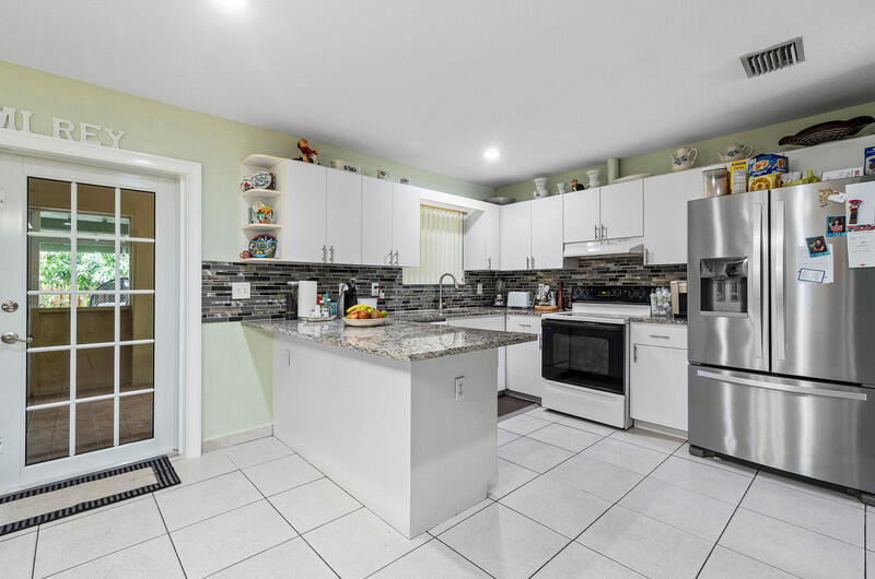 3525 Hunt Road Palm Springs, FL 33461 - Photo 9 of 29 untitled-9.jpg-vsuniqueid-62f536442d452
