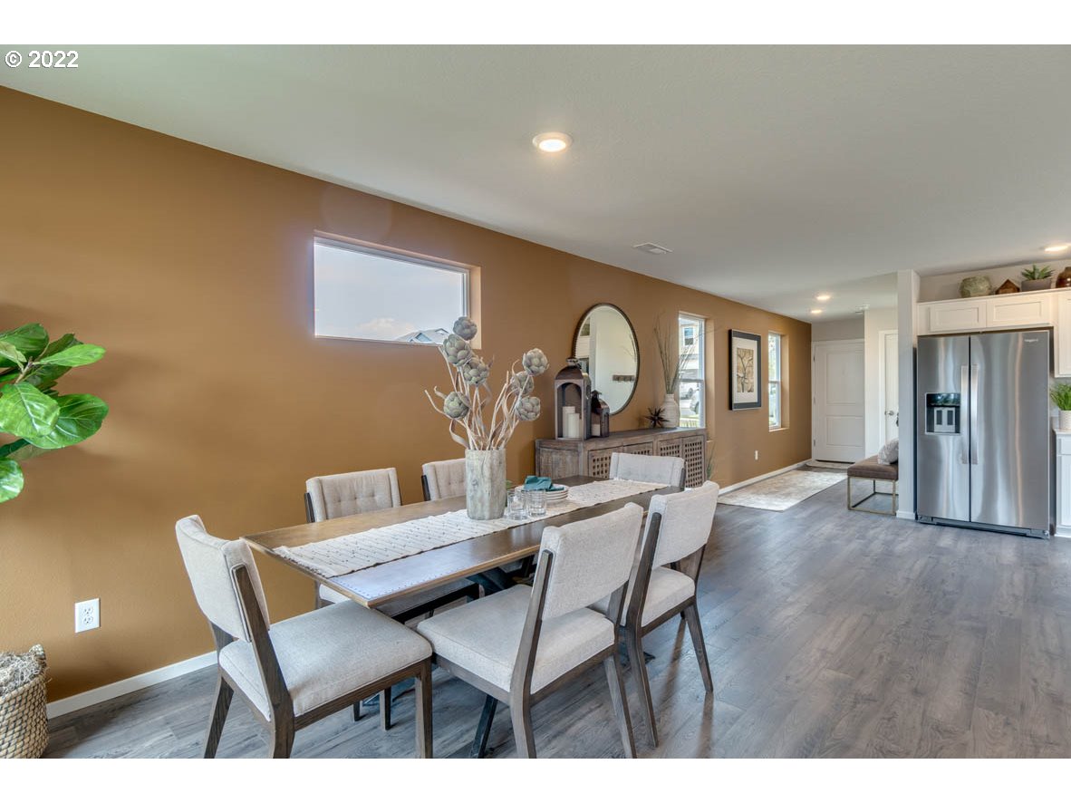2914 North 3rd Way Ridgefield, WA 98642 - Photo 7 of 24 a living room with furniture and a wooden floor