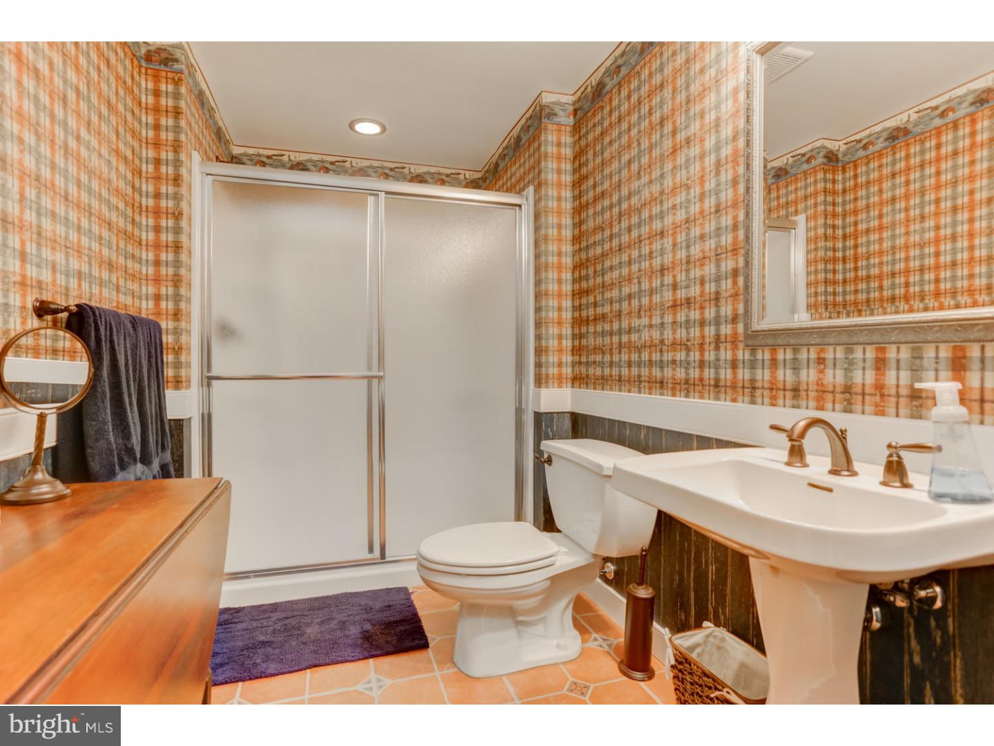 1710 Hickory Hill Road Chadds Ford, PA 19317 - Photo 11 of 25 a bathroom with a sink toilet and shower