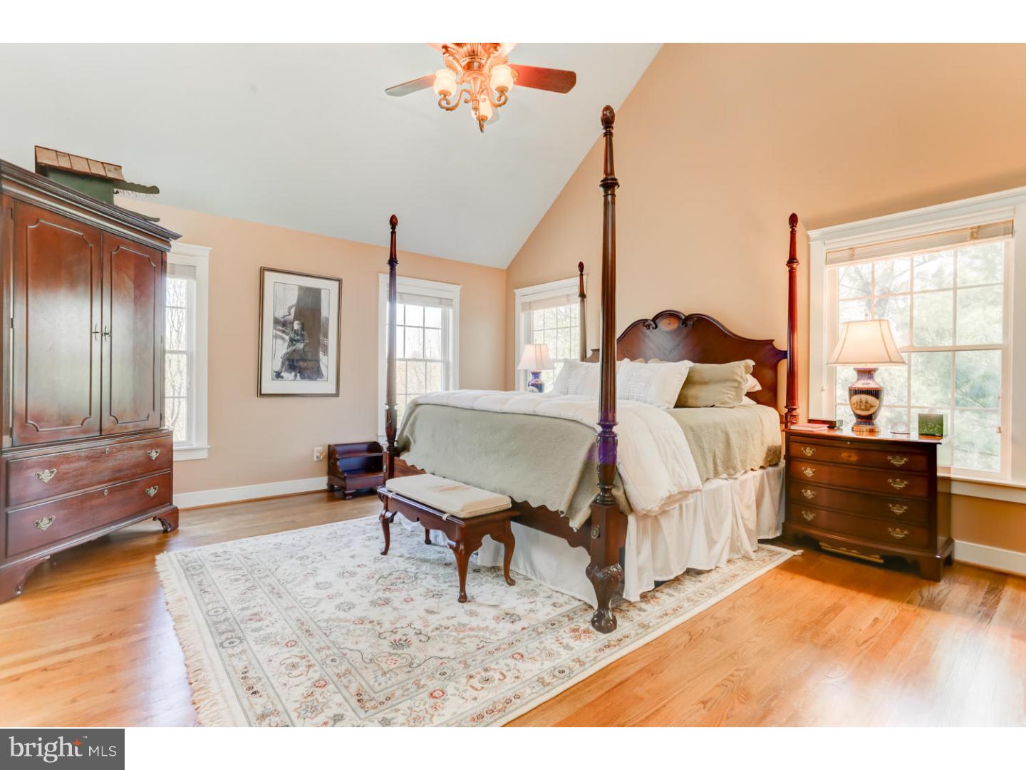 1710 Hickory Hill Road Chadds Ford, PA 19317 - Photo 13 of 25 a bedroom with a bed and wooden floor