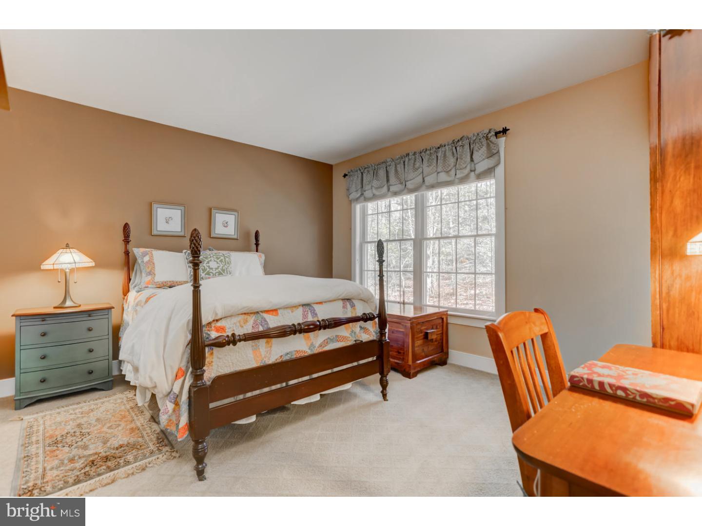 1710 Hickory Hill Road Chadds Ford, PA 19317 - Photo 15 of 25 a bedroom with a bed and a couch