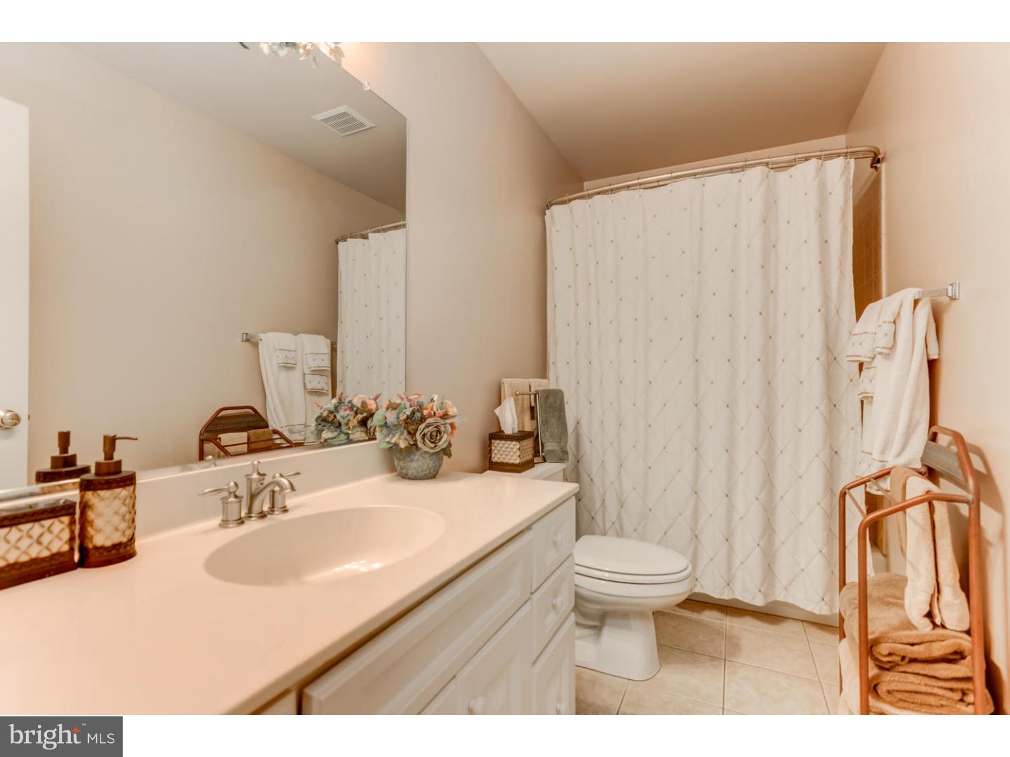 1710 Hickory Hill Road Chadds Ford, PA 19317 - Photo 19 of 25 a bathroom with a sink toilet and shower