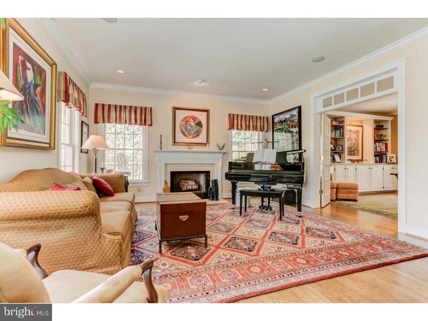 1710 Hickory Hill Road Chadds Ford, PA 19317 - Photo 4 of 25 a living room with furniture a rug and a fireplace