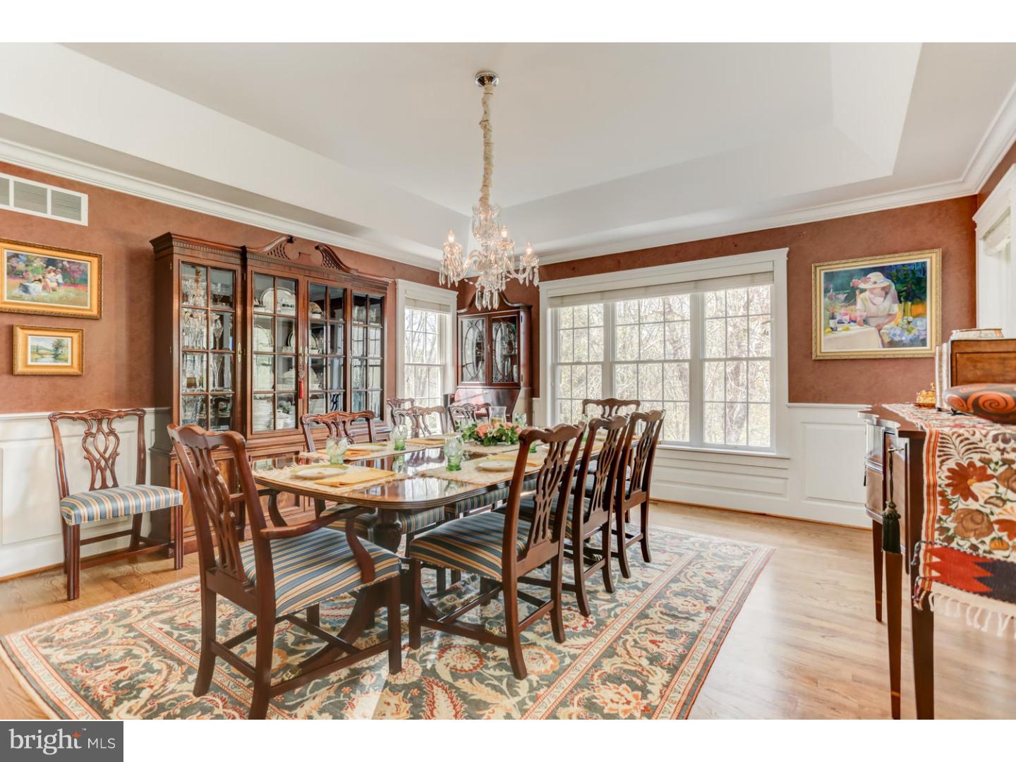 1710 Hickory Hill Road Chadds Ford, PA 19317 - Photo 6 of 25 a dining room with furniture a chandelier and wooden floor