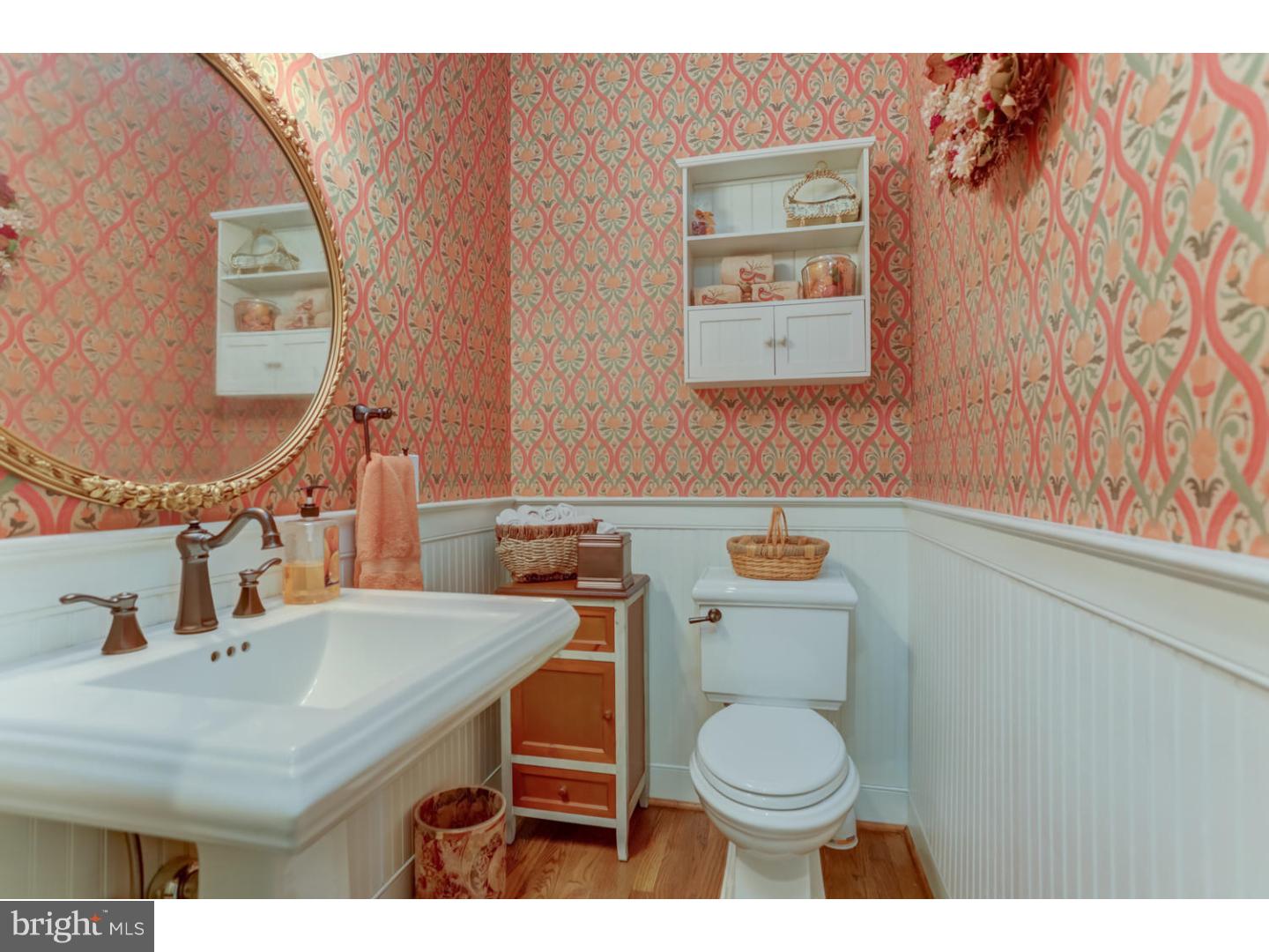 1710 Hickory Hill Road Chadds Ford, PA 19317 - Photo 10 of 25 a bathroom with a toilet a sink and mirror