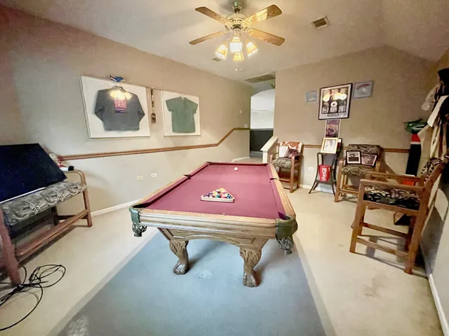 a room with furniture and a flat screen tv