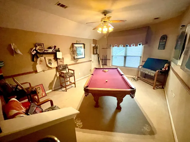 a kitchen with sink and stove