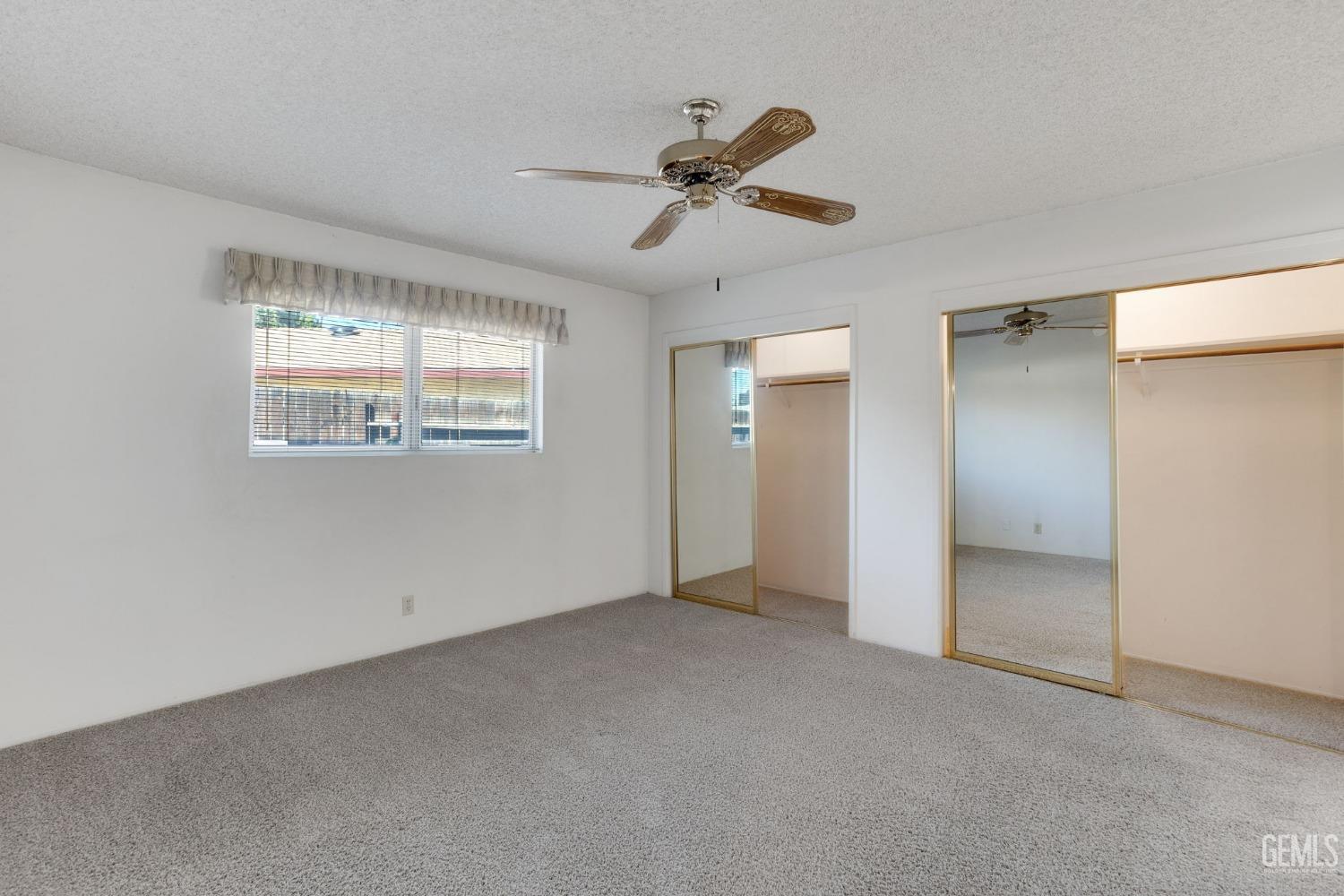 Undisclosed Address Bakersfield, CA 93309 - Photo 25 of 43 a view of an empty room with a window