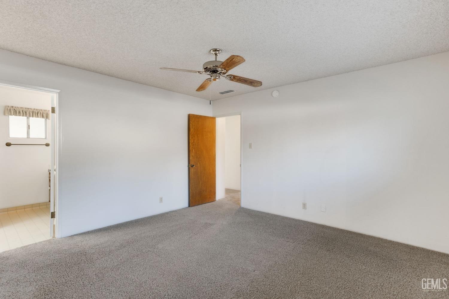 Undisclosed Address Bakersfield, CA 93309 - Photo 27 of 43 a view of a chandelier fan in a room