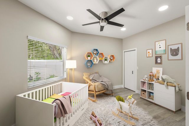 a bedroom with furniture or couch and a window