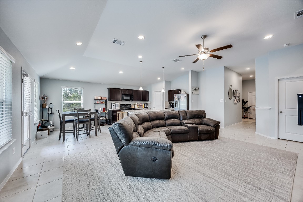 21302 Santa Rosa Avenue Lago Vista, TX 78645 - Photo 26 of 26 a living room with furniture and wooden floor