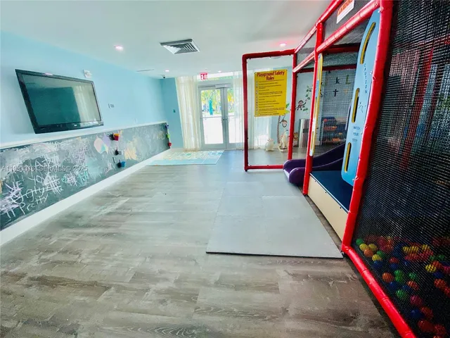 a view of swimming pool with outdoor seating