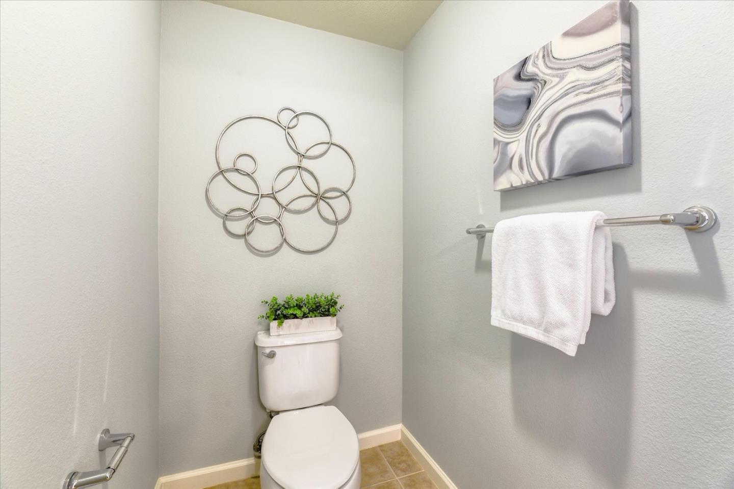 1883 Agnew Road, Unit 357 Santa Clara, CA 95054 - Photo 15 of 27 a bathroom with a toilet and a mirror