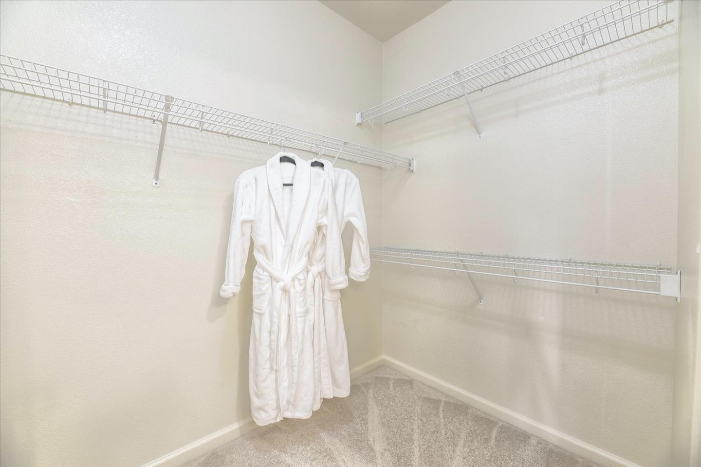 1883 Agnew Road, Unit 357 Santa Clara, CA 95054 - Photo 16 of 27 a bathroom with a shower and a glass door