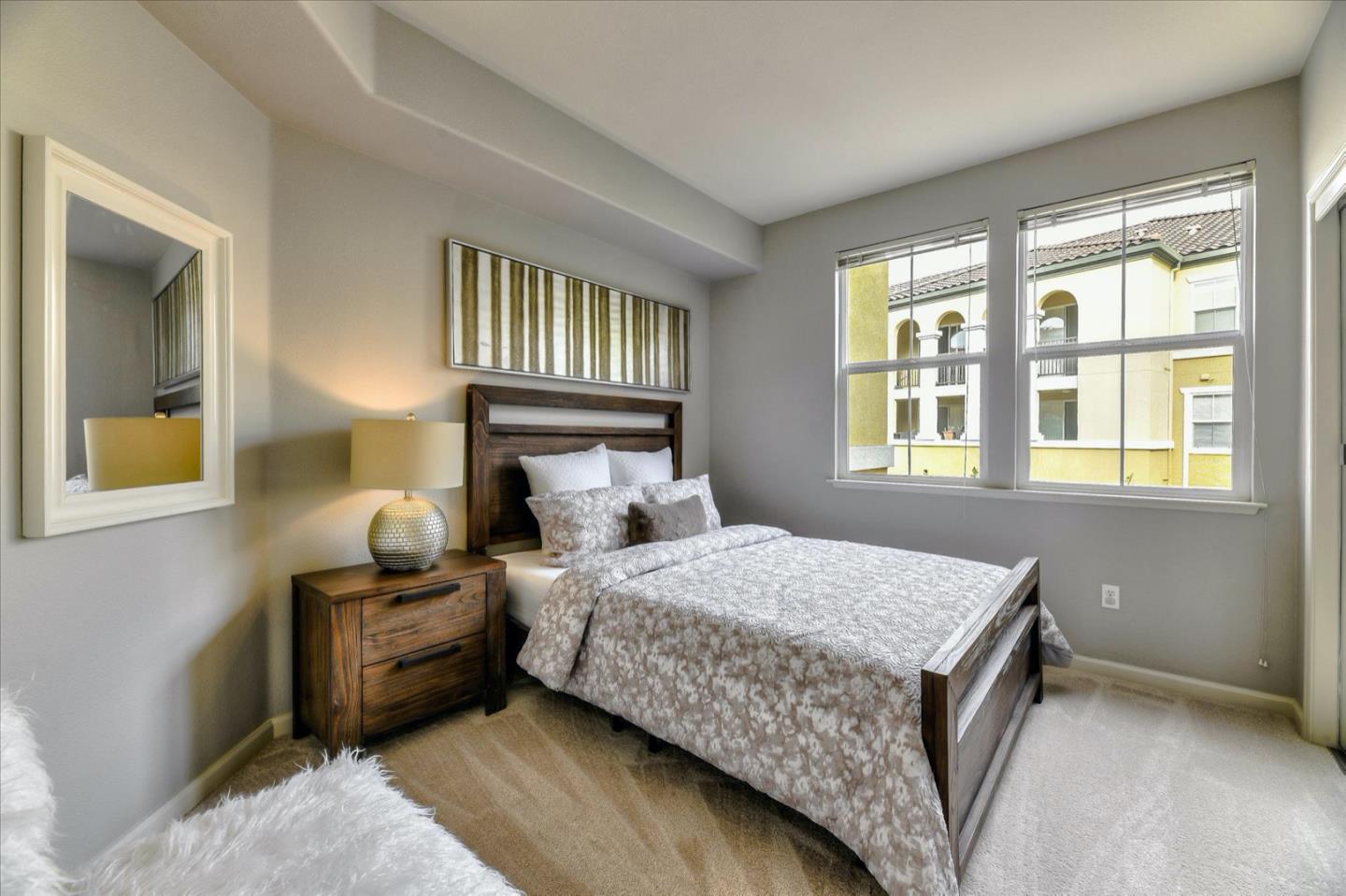 1883 Agnew Road, Unit 357 Santa Clara, CA 95054 - Photo 17 of 27 a bedroom with a bed and a window